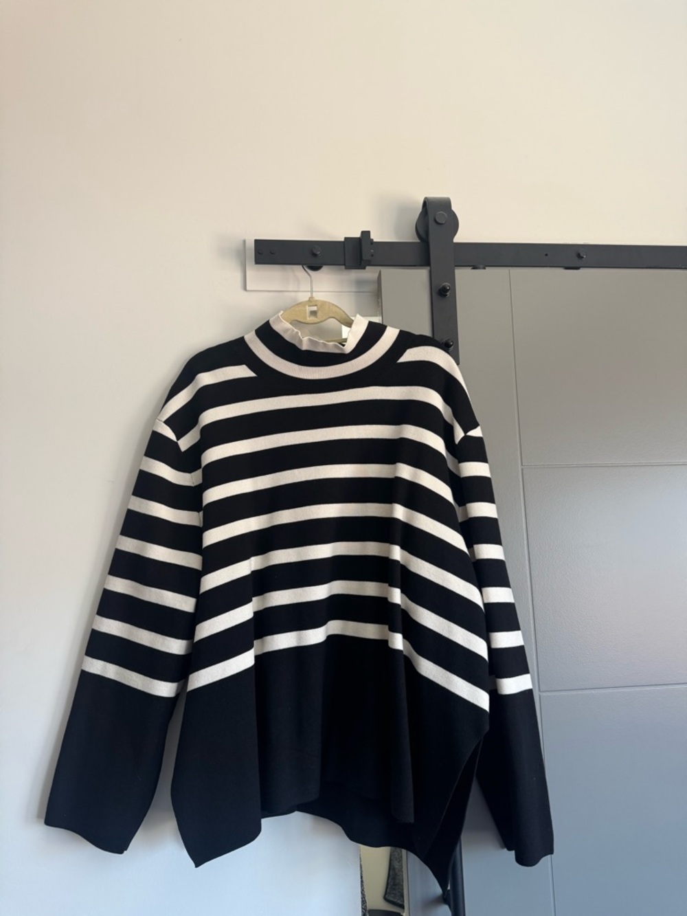 Women’s Black and White Striped Mockneck Sweater with side slit